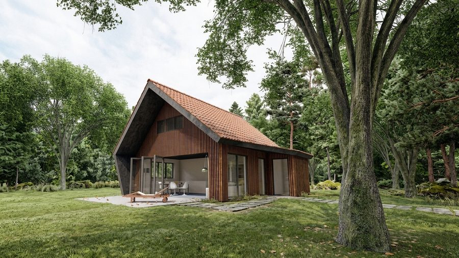 Recreatiewoning tussen de bomen bij Zuidlaren, met een houten gevel onder een overstek