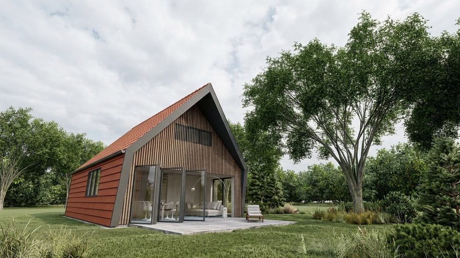 De kopgevel van de recreatiewoning, met glas over de volle hoogte onder de kap