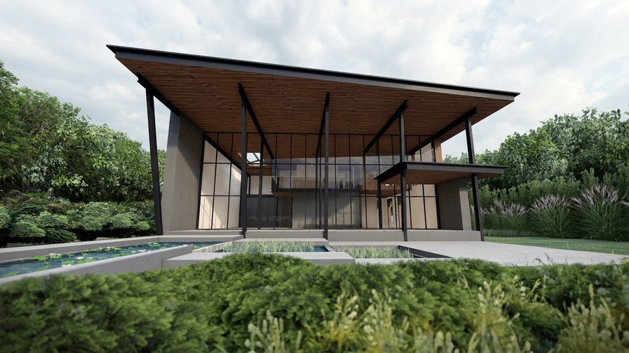 Zijaanzicht van de villa met het overstekende dak en de doorlopende pui