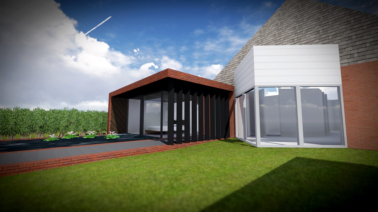 De aanbouw vanaf de tuin, met verticale houten delen naast het bestaande huis