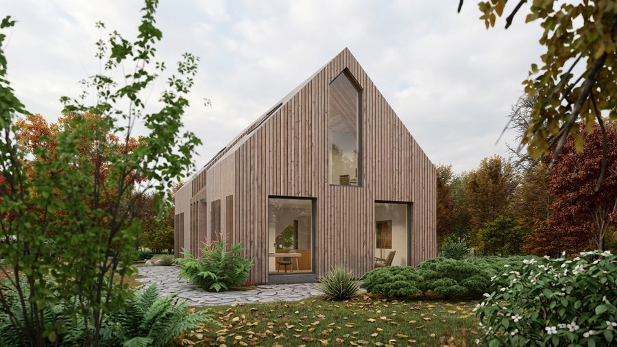 Kopgevel van de woning met een hoog raam in de punt van de kap