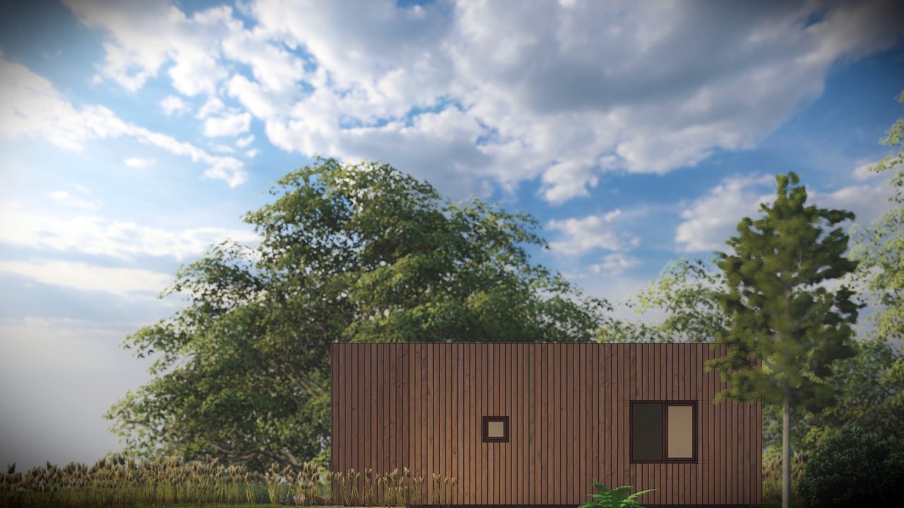 Gevelaanzicht van de recreatiewoning onder een heldere lucht