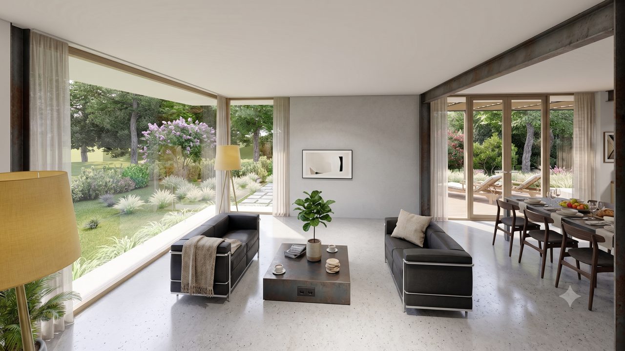 Woonkamer met grote puien die uitkijken op de tuin