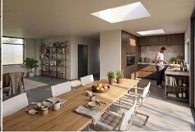 Doorkijk vanuit de woonkamer naar de keuken en de tuin daarachter