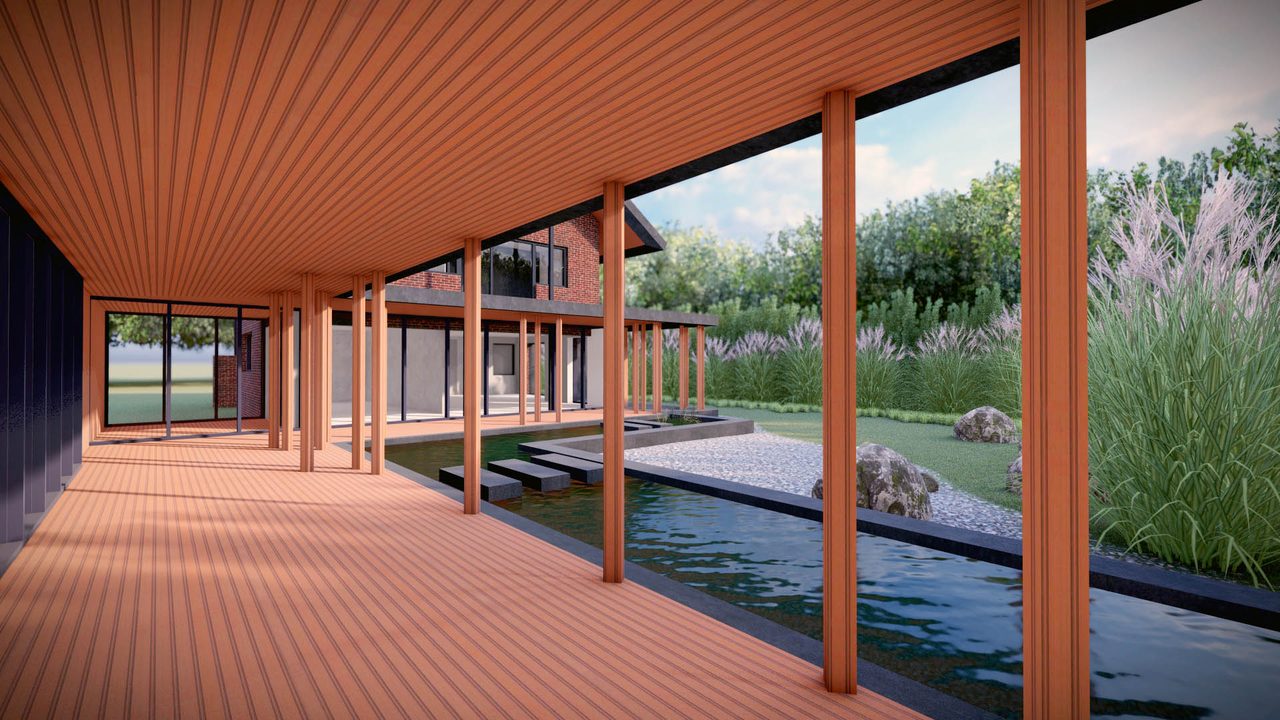 De waterpartij langs de veranda, met de gevel van de woning erachter